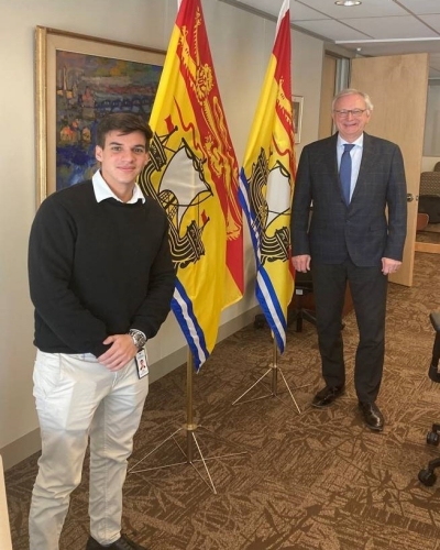 Gabriel Marquez (left) and Premier Blaine Higgs in the Cabinet Room at Chancery Place in Fredericton.